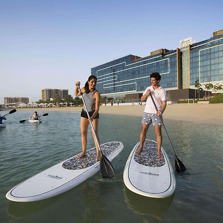 Fairmont Bab Al Bahr Hotel Абу Даби Екстериор снимка Stand Up Paddle Boarding at Jumeirah Beach Hotel